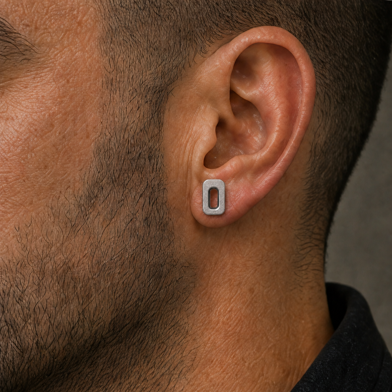 PORTAL 01 shown at scale on the ear